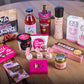 Pink-inspireret gavekurv med en blanding af lækre godter